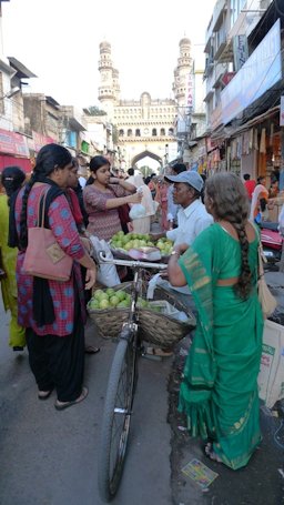 Fruit vendor selling guavas at Laad Bazar near Charminar, Hyderabad.