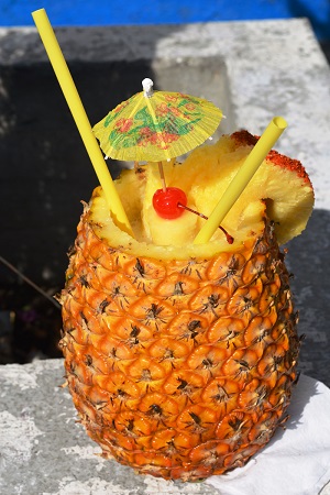 Piña colada served in a pineapple at the Carnival of Santa Marta Acatitla, Iztapalapa, Mexico City