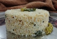 Coconut rice is traditionally made in south india along with crushed red chillies and curry leaves