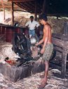 Extracting the fiber from the husk (Sri Lanka)