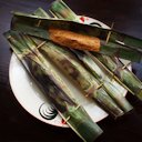Otak-otak from a shop in Katong, Singapore. Puréed fish is mixed with a chilli paste, coconut milk and egg and then grilled, wrapped inside two sections of coconut palm leaf