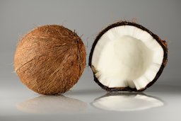 Coconuts – single and cracked open. Grown in Dominican Republic