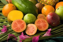 Guava, the juicy, pink, sliced fruit in the center, is high in antioxidants