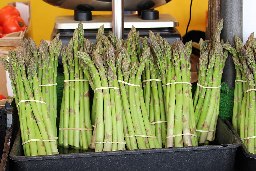 Garden asparagus or sparrow grass (Asparagus officinalis) in a market in Cambridge, England