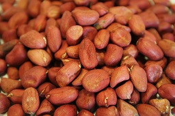 Heap of uncooked peanuts (Arachis hypogaea)