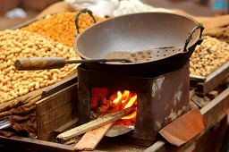 Frying Peanuts on a street shop of Dhaka