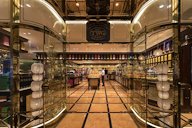 Tea shop entrance, windows and interior, at Marina Bay Sands shopping mall, Singapore